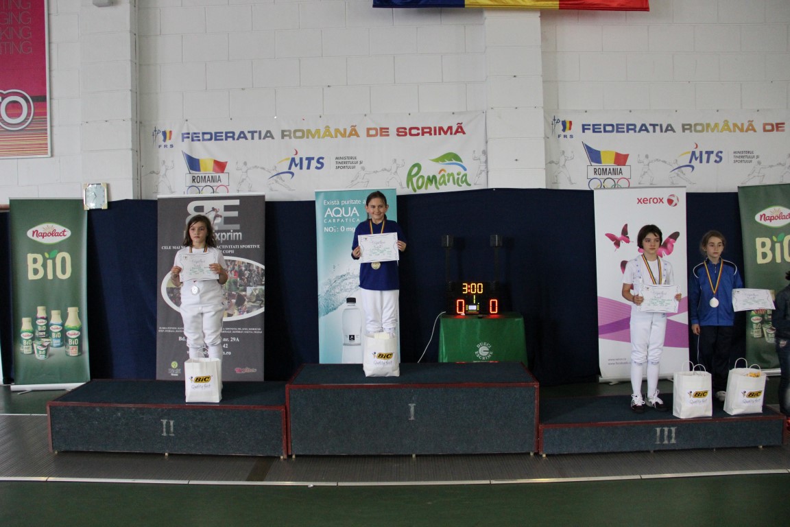 Ilinca Hogea (CS Riposta) a câștigat medalia de aur la Campionatul Național de scrimă pentru copii, în proba de sabie feminin, categoria 8-9 ani